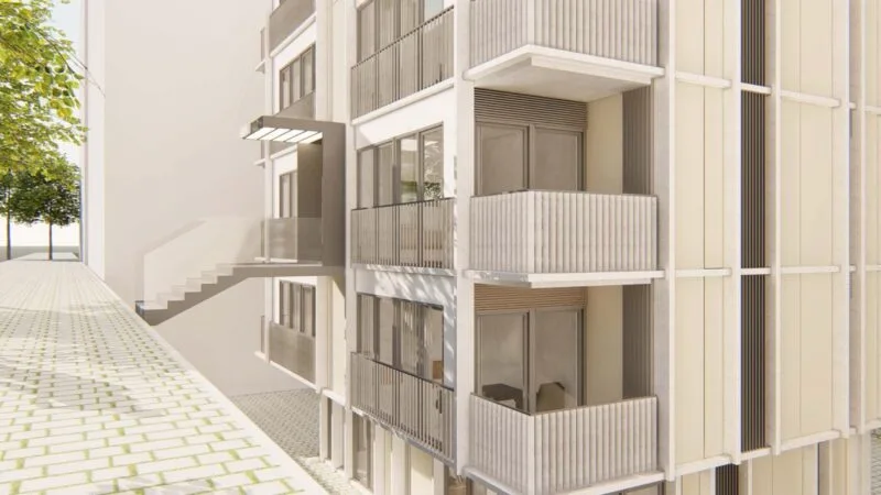 Close up of an apartment building in Dikilitas showing the entrance and balconies