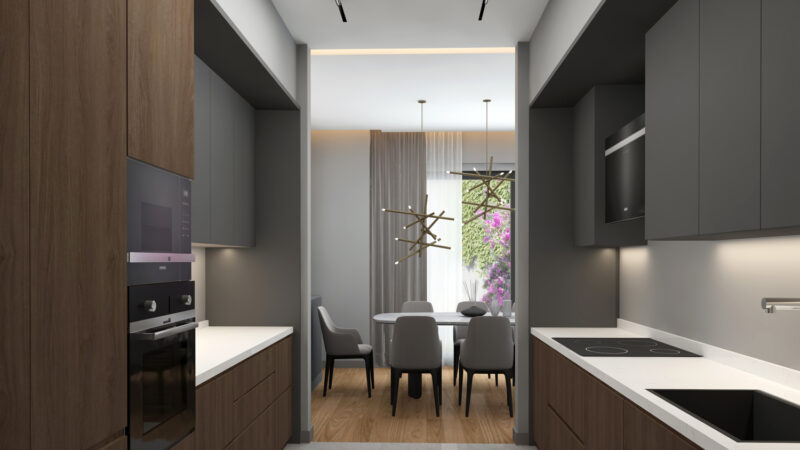 View of the kitchen finished in walnut cabinets