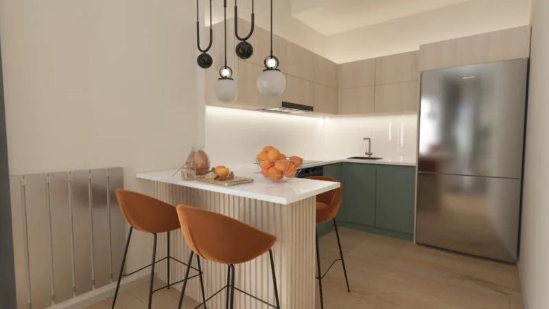 Image of a corner kitchen with a breakfast bar and two stalls