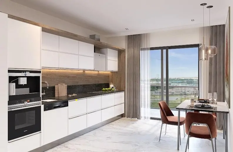 Kitchen with white cabinets and floor to ceiling windows