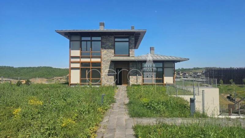 Large three story villa with a large garden