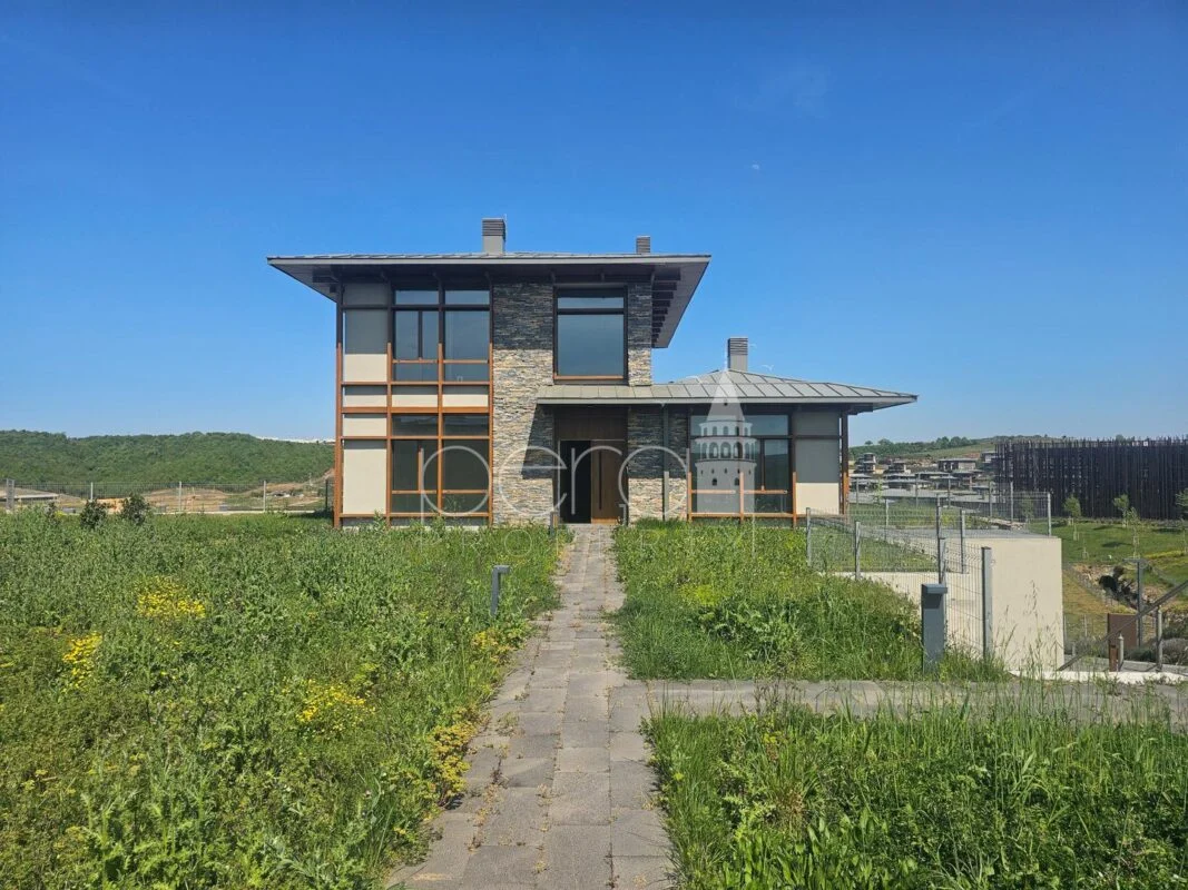 Large three story villa with a large garden