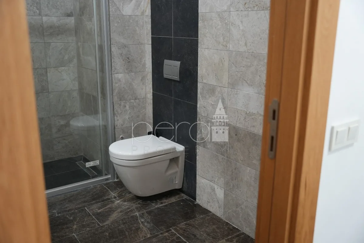A view of the bathroom showing the shower and WC